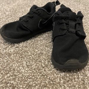 Toddler black Nike shoes